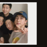 First OT7 photo after BTS Military service, shared by RM on Instagram. The seven BTS members—Jin, SUGA, j-hope, RM, Jimin, V, and Jungkook—stand side by side, smiling and reunited in a casual, joyful moment. This image marks the official end of their military chapter. Featured in the full article on Bangtan Now.
