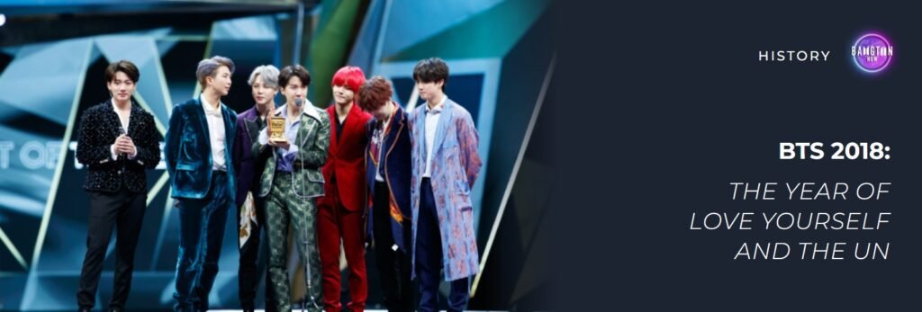 BTS 2018: the seven BTS members on stage at an awards show, with the title “The year of Love Yourself and the UN”